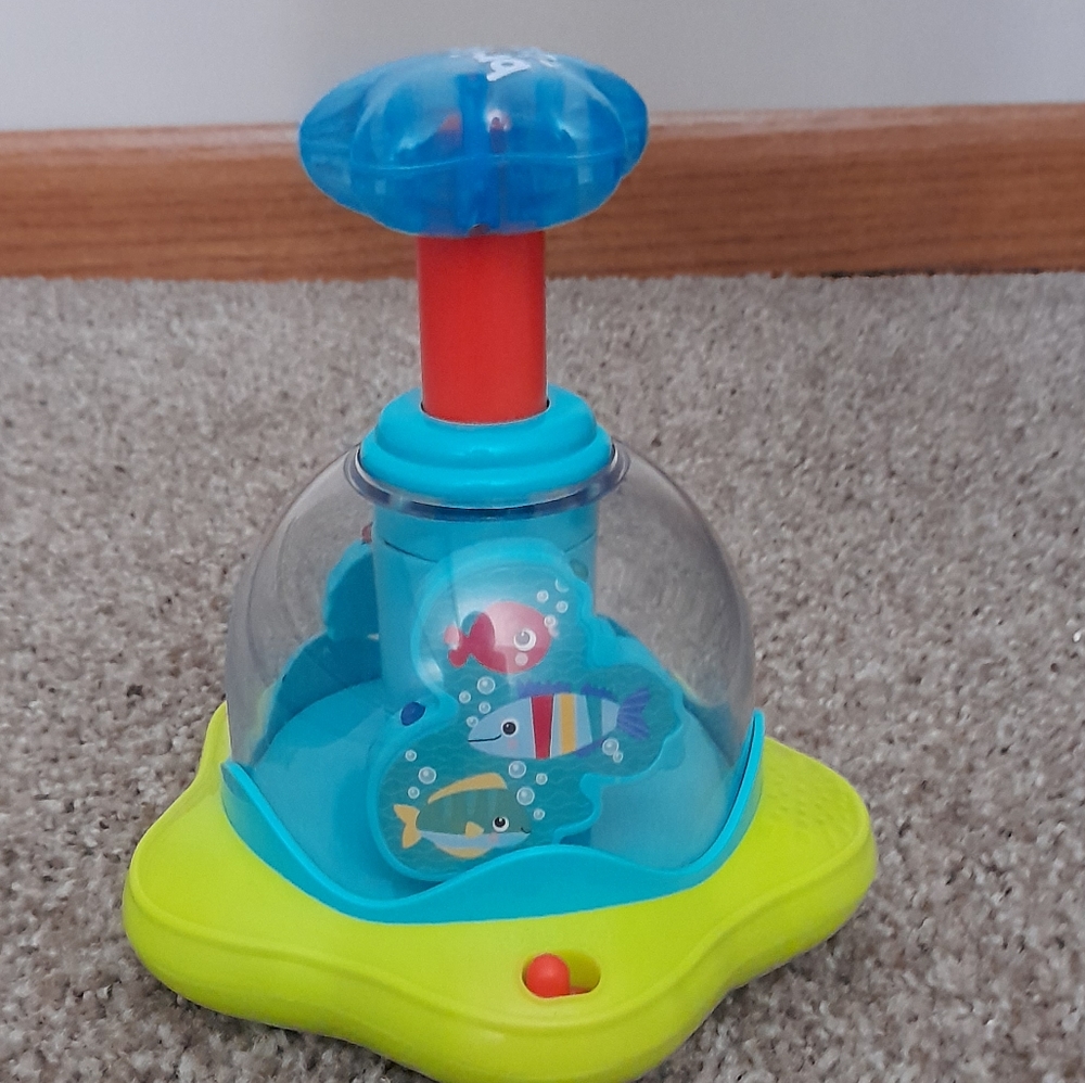 Press & Glow Spinner